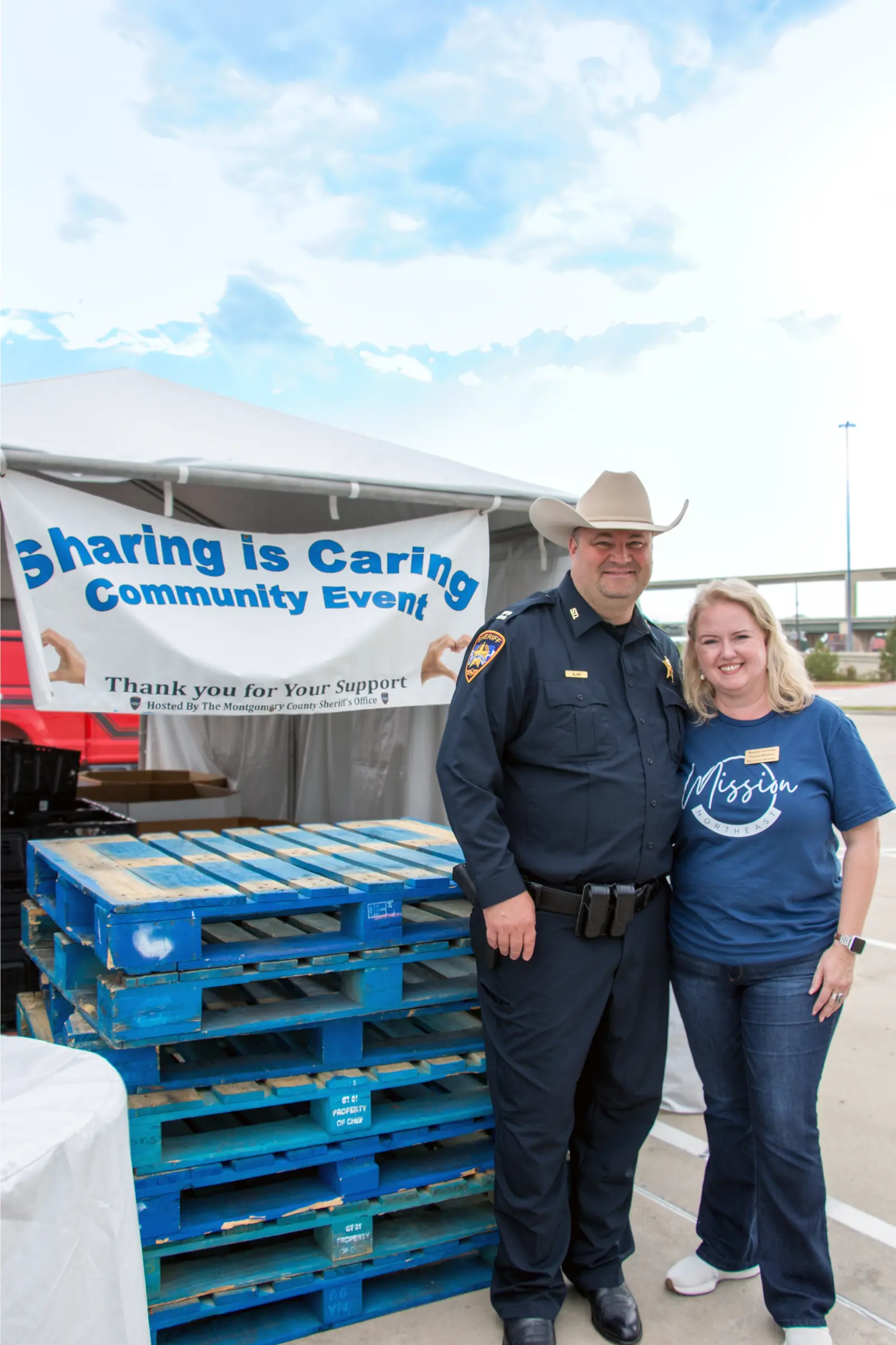 A sheriff’s deputy and a Mission Northeast volunteer at the community event.